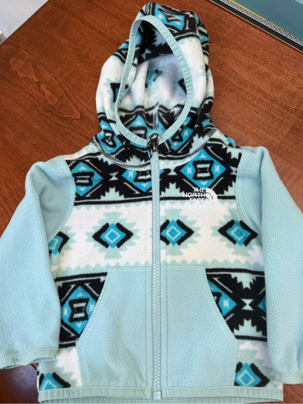 The North Face baby 6-12mo Blue Aztec Hooded Fleece Jacket worn less than 5x